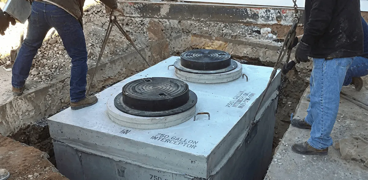 Grease trap installation for a commercial property drainage system in Mesa, AZ